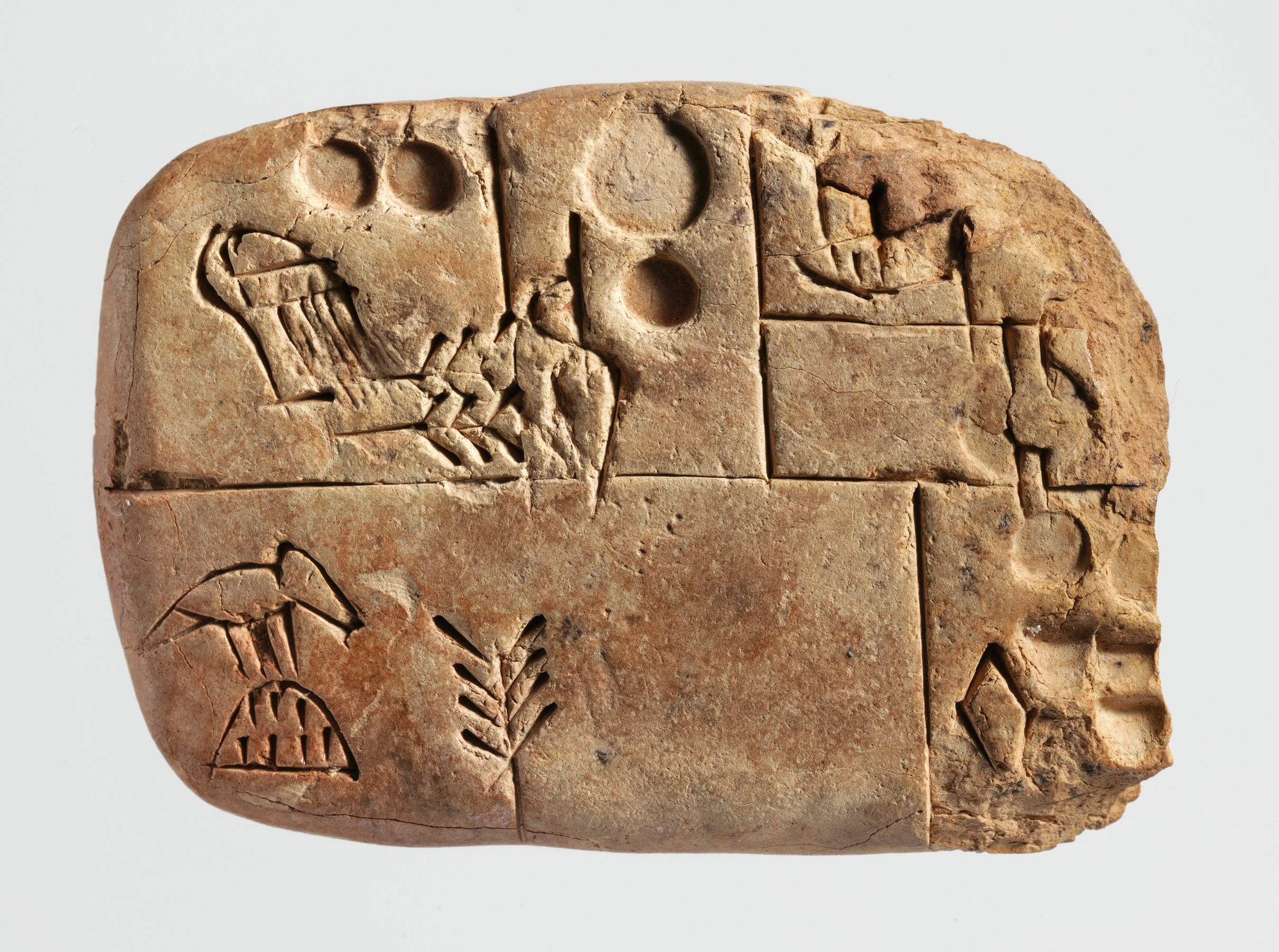 Cuneiform tablet: administrative account concerning the distribution of barley and emmer.